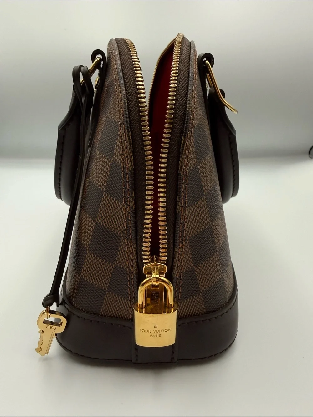 Louis Vuitton Brown Damier Ebene Alma BB with Gold Hardware